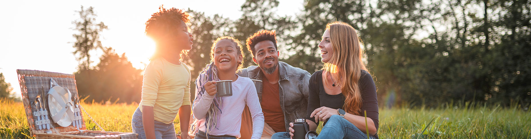 family-outside-having-picnic