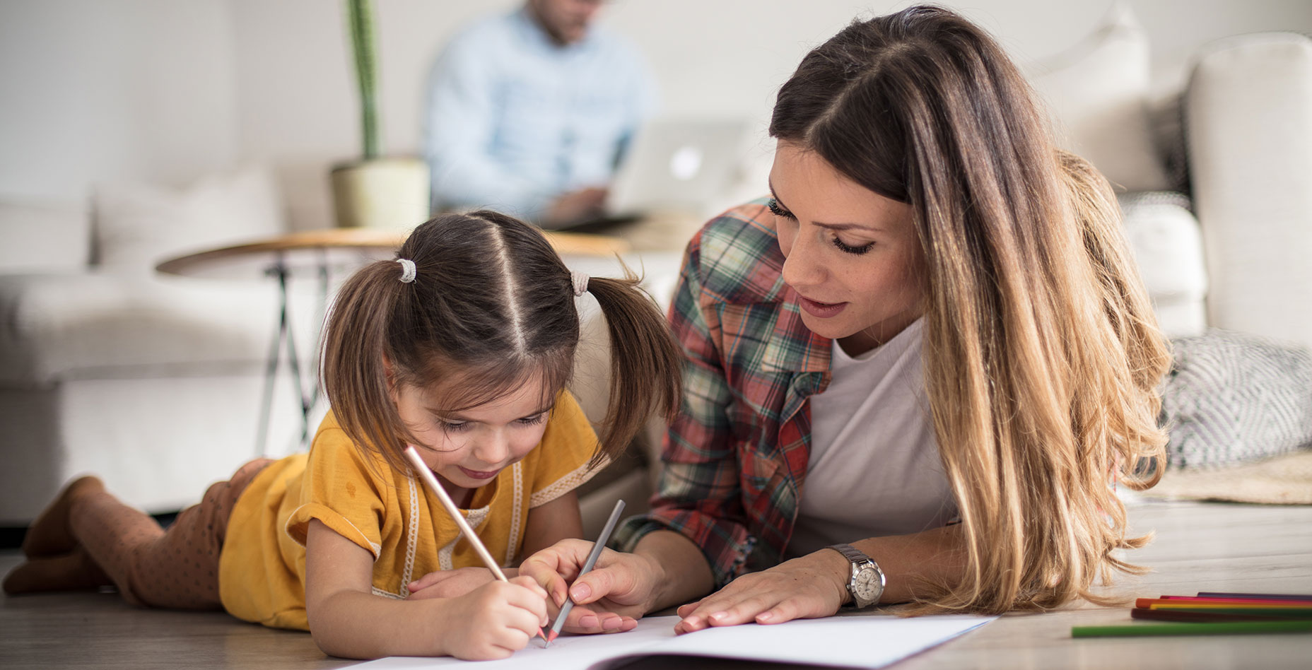 mom-and-child-writing-on-floor