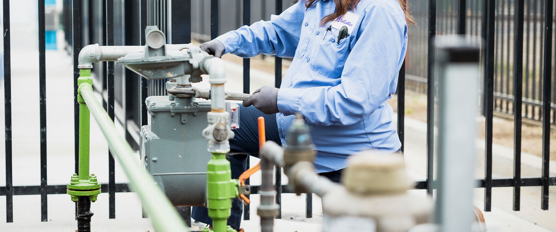 SCG employee working gas meter