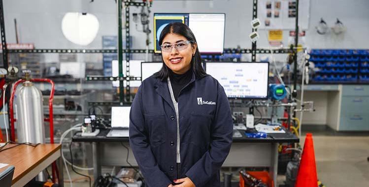 employee female smiling in lab (2)