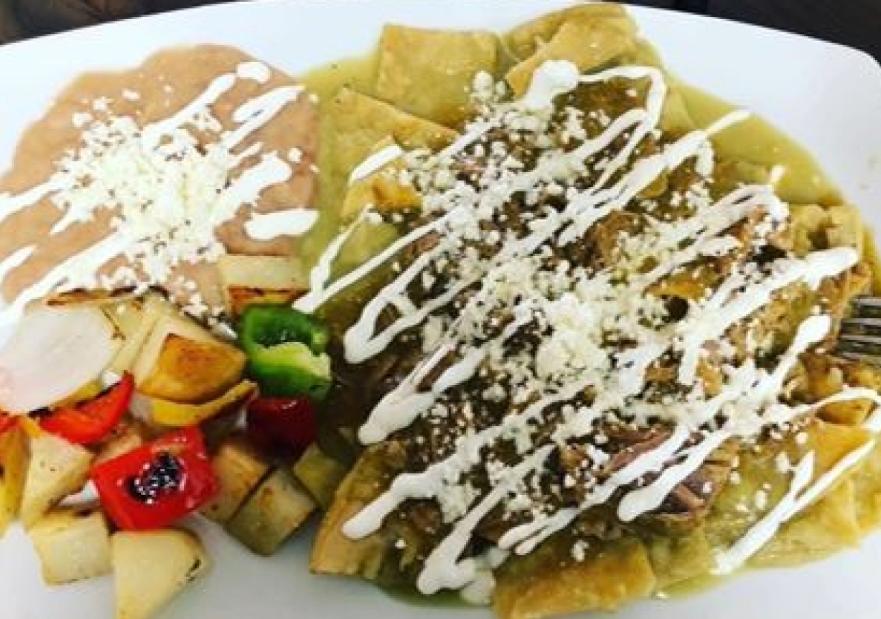 An image of a spanish food plate and a churro
