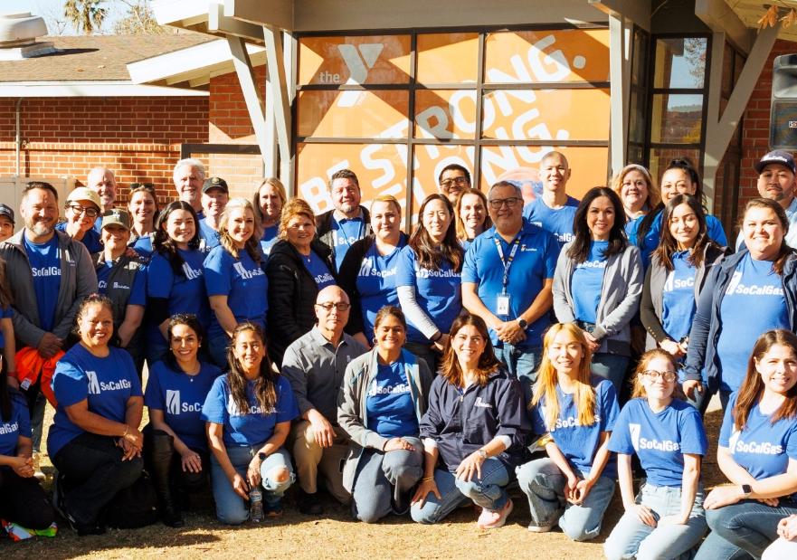 SoCalGas Volunteers posing for photo in front of the YMCA