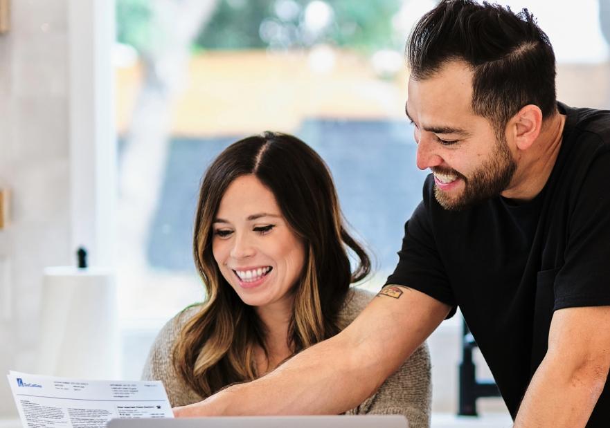 Couple Looking at a Bill