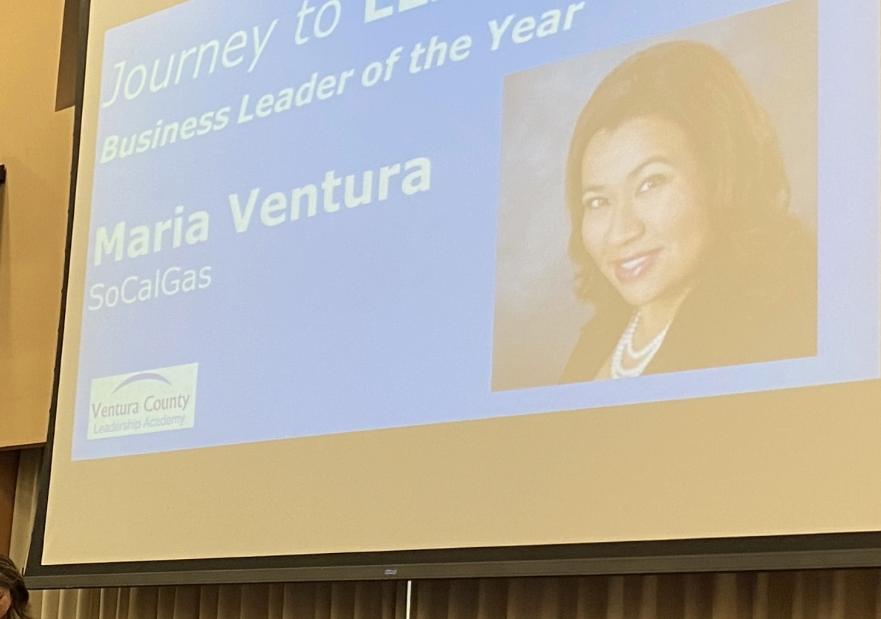 Maria Ventura at the podium at the 2022 Business Leader Awards